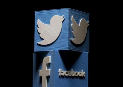 3D-printed Facebook and Twitter logos are seen in this picture illustration made in Zenica, Bosnia and Herzegovina on January 26, 2016. PHOTO BY REUTERS/Dado Ruvic