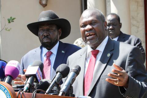 Riek Machar, former vice president and rebel leader, speaks during a news statement with South Sudan's President Salva Kiir Mayardit (L) after their meeting in which they have reached a deal to form a long-delayed unity government in Juba, South Sudan, December 17, 2019. PHOTO BY REUTERS/Jok Solomun