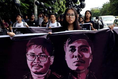 People march to show solidarity for jailed Reuters journalists Wa Lone and Kyaw Soe Oo two days before a local court is due to deliver verdict against them on charges of breaching the country's Official Secrets Act in Yangon, Myanmar, September 1, 2018. PHOTO BY REUTERS/Ann Wang