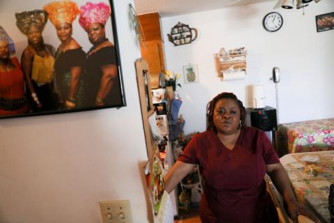 Deferred Enforced Departure (DED) status holder Marie Zar prepares for work the day after U.S. President Donald Trump granted a one-year extension of her immigration status, in Brooklyn Center, Minnesota, U.S., March 29, 2019. PHOTO BY REUTERS/Jonathan Ernst