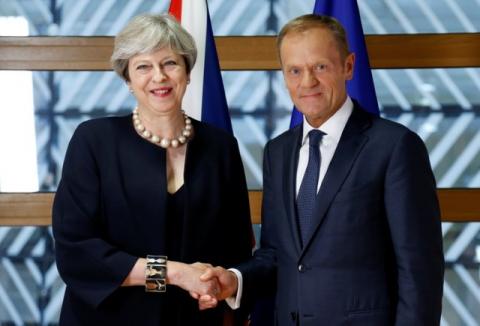 British Prime Minister Theresa May and European Council President Donald Tusk pose during a EU leaders summit in Brussels, Belgium, June 22, 2017. PHOTO BY REUTERS/Francois Lenoir