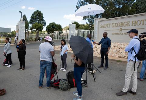 Members of the media gather outside a hotel where members of the African National Congress (ANC) National Executive Committee are meeting to decide the fate of President Jacob Zuma, in Pretoria, South Africa, February 12, 2018. PHOTO BY REUTERS/James Oatway