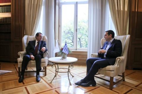 Greek Prime Minister Alexis Tsipras meets with Cypriot President Nicos Anastasiades at the Maximos Mansion in Athens, Greece, December 30, 2016. PHOTO BY REUTERS/Alkis Konstantinidis