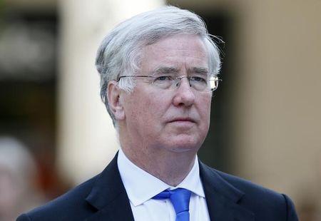 Britain's Defence Secretary Michael Fallon arrives to attend a national service of commemoration to mark the 200th anniversary of the Battle of Waterloo at St Paul's Cathedral in central London, Britain June 18, 2015. REUTERS/Stefan Wermuth