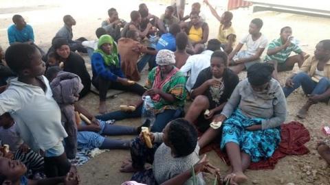 Migrants, who were rescued by the Libyan coastguard after their boat sank off the coastal town of Garabulli, rest east of Tripoli, Libya October 3, 2016. Picture taken October 3, 2016. REUTERS/Stringer