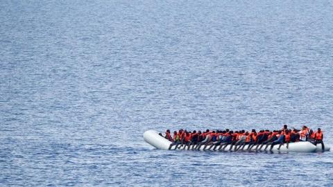 Migrants wait to be rescued by "Save the Children" NGO crew from the ship Vos Hestia in the Mediterranean sea off Libya coast, June 18, 2017. PHOTO BY REUTERS/Stefano Rellandini