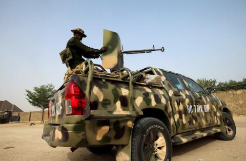 Nigerian military prepare to cordon the area where a man was killed by suspected militants during an attack around Polo area of Maiduguri, Nigeria, February 16, 2019. PHOTO BY REUTERS/Afolabi Sotunde