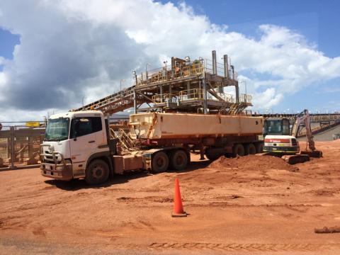 A truck loaded with bauxite as coming to a stop at Rio Tinto's Weipa operations, is pictured through a car's window in Cape York, on the Cape York Peninsula, on the north-eastern tip of Australia, March 7, 2019. PHOTO BY REUTERS/Melanie Burton