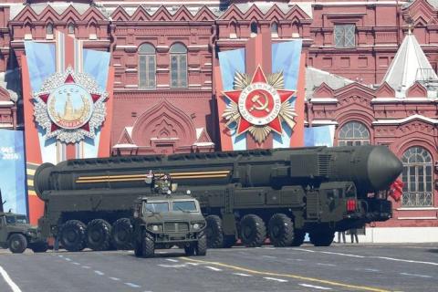 A Russian mobile Topol-M missile launching unit drives during the Victory Day parade in Moscow's Red Square, May 9, 2014. PHOTO BY REUTERS/Grigory Dukor