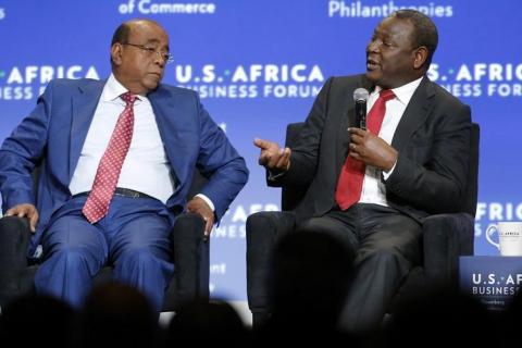 Mo Ibrahim Foundation Founder and Chair Mo Ibrahim (L) and Equity Bank Group CEO James Mwangi participate in a panel discussion on investment during the U.S.-Africa Business Forum in Washington