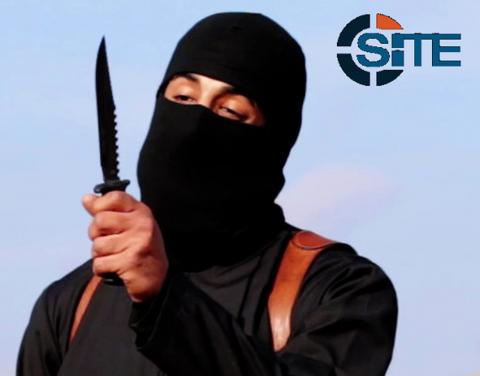 A masked, black-clad militant, who has been identified by the Washington Post newspaper as a Briton named Mohammed Emwazi, brandishes a knife in this still image from a 2014 video obtained from SITE Intel Group, February 26, 2015. PHOTO BY REUTERS/SITE Intel Group