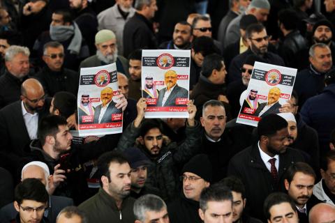 People holding pictures of Saudi journalist Jamal Khashoggi attend a symbolic funeral prayer for Khashoggi at the courtyard of Fatih mosque in Istanbul, Turkey, November 16, 2018. PHOTO BY REUTERS/Huseyin Aldemir