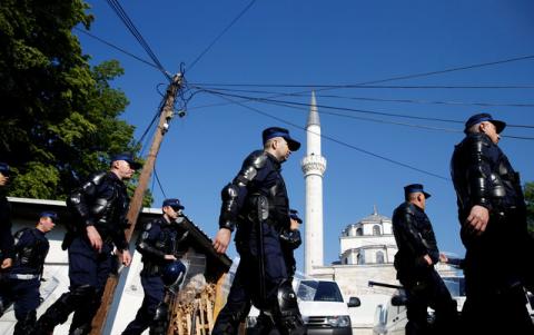 Member of a special police unit take up positions in front of the Ferhadija mosque before an opening ceremony in Banja Luka, May 7, 2016. PHOTO BY REUTERS/Dado Ruvic