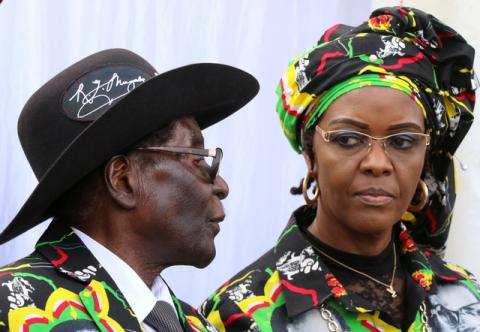 President Robert Mugabe and his wife Grace attend a rally of his ruling ZANU (PF) in Chinhoyi, Zimbabwe, July 29, 2017. PHOTO BY REUTERS/Philimon Bulawayo