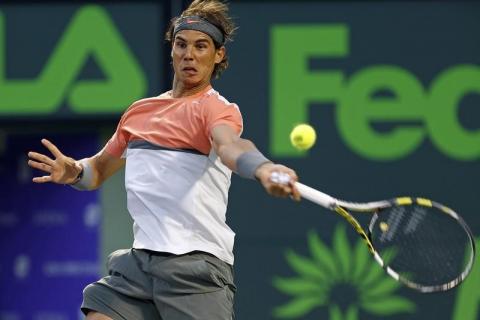 Rafael Nadal hits a forehand against Milos Raonic (not pictured) on day eleven of the Sony Open at Crandon Tennis Center, Miami
