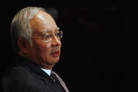 Malaysia's Prime Minister Najib Razak speaks to Reuters during an interview in Melbourne, March 4, 2011. PHOTO BY REUTERS/Mick Tsikas