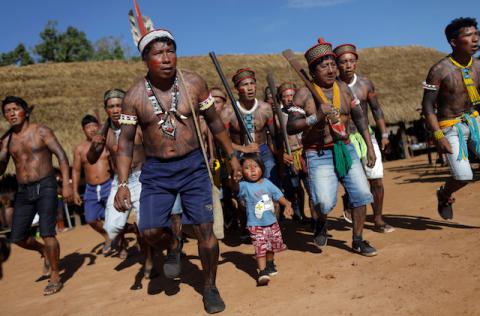 Indigenous people of Yudja tribe, perform a greeting dance during a four-day pow wow in Piaracu village, in Xingu Indigenous Park, near Sao Jose do Xingu, Mato Grosso state, Brazil, January 14, 2020. PHOTO BY REUTERS/Ricardo Moraes