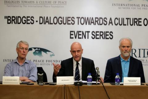 Uwe Morawetz (C), chairman of International Peace Foundation, speaks next to Nobel laureate Richard Roberts (L) and Prince Alfred of Liechtenstein at a news conference in Beijing, China, May 7, 2016. PHOTO BY REUTERS/Jason Lee