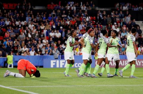 Nigeria's Chiamaka Nnadozie celebrates saving a penalty. PHOTO BY REUTERS/Stephane Mahe