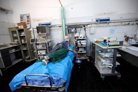 A patient lies on a bed as she receives treatment at Tripoli Central Hospital in Tripoli, Libya July 18, 2016. PHOTO BY REUTERS/Ismail Zitouny