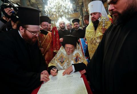 Ecumenical Patriarch Bartholomew and Metropolitan Epifaniy, head of the Orthodox Church of Ukraine, attend a signing ceremony marking the new Ukrainian Orthodox church's independence, at St. George's Cathedral, the seat of the Ecumenical Patriarchate, in Istanbul, Turkey, January 5, 2019. PHOTO BY REUTERS/Murad Sezer