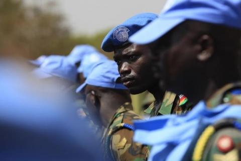 Ghanian U.N. peacekeepers stand at attention upon arriving in Juba, February 28, 2014. PHOTO BY REUTERS/Andreea Campeanu