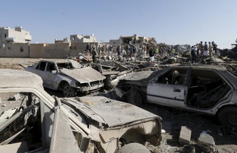 People search for survivors under the rubble of houses destroyed by an air strike near Sanaa Airport, March 26, 2015. PHOTO BY REUTERS/Khaled Abdullah