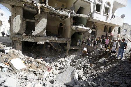 People gather at the site of a Saudi-led air strike in Yemen's capital Sanaa, September 22, 2015. PHOTO BY REUTERS/Khaled Abdullah