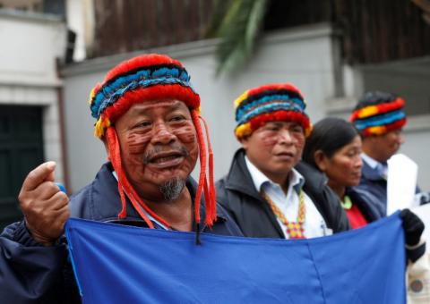 Peruvian indigenous people opposing an approved plan for oil drilling in PeruÕs Amazon, speak with the media during a protest in front of the offices of Geopark Ltd in Santiago, Chile, June 27, 2019. PHOTO BY REUTERS/Rodrigo Garrido