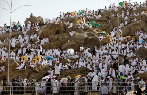 Muslim pilgrims gather on Mount Mercy on the plains of Arafat during the annual haj pilgrimage, outside the holy city of Mecca, Saudi Arabia, August 20, 2018. PHOTO BY REUTERS/Zohra Bensemra