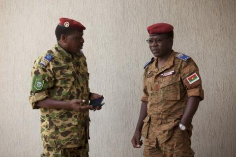 Burkina Faso's Army chief of staff General Pingrenoma Zagre (R) speaks to a member of the presidential guard in Ouagadougou, Burkina Faso, September 18, 2015. PHOTO BY REUTERS/Joe Penney