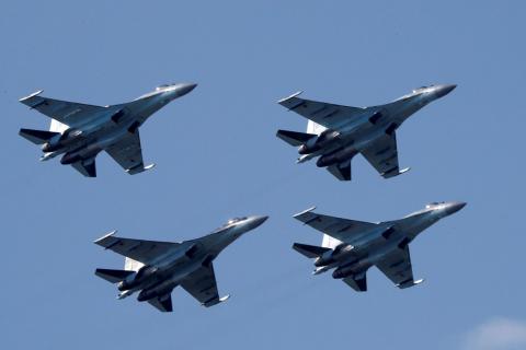 Sukhoi Su-35 multi-role fighters of the Sokoly Rossii (Falcons of Russia) aerobatic team fly in formation during a demonstration flight at the MAKS 2017 air show in Zhukovsky, outside Moscow, Russia, July 21, 2017. PHOTO BY REUTERS/Sergei Karpukhin