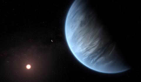 An artist's impression released by NASA on September 11, 2019 shows the planet K2-18b, its host star and an accompanying planet. PHOTO BY REUTERS/ESA/Hubble/M. Kornmesser/NASA 