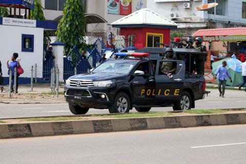A police vehicle drives along Banex road after dispersing members of the Islamic Movement of Nigeria (IMN) from the street in Abuja, Nigeria, July 23, 2019. PHOTO BY REUTERS/Afolabi Sotunde