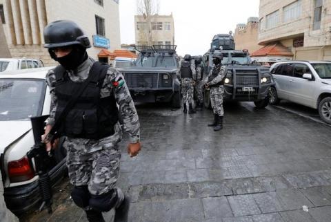 Jordanian policemen stand guard after ending the security operations in the vicinity of Karak Castle, where armed gunmen carried out an attack yesterday, in the city of Karak, Jordan, December 19, 2016. PHOTO BY REUTERS/Muhammad Hamed