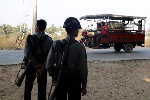 Myanmar policemen stand in a check point outside Rohingya refugee camp in Sittwe, Myanmar, March 3, 2017. PHOTO BY REUTERS/Soe Zeya Tun