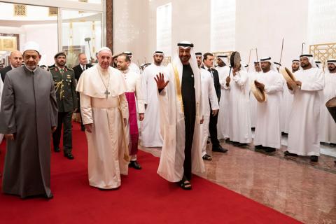 Pope Francis, Head of the Catholic Church is welcomed by Abu Dhabi's Crown Prince Mohammed bin Zayed Al-Nahyan and Sheikh Ahmed Mohamed el-Tayeb, Egyptian Imam of al-Azhar Mosque, upon his arrival at Abu Dhabi International airport in Abu Dhabi, United Arab Emirates, February 3, 2019. PHOTO BY REUTERS/WAM