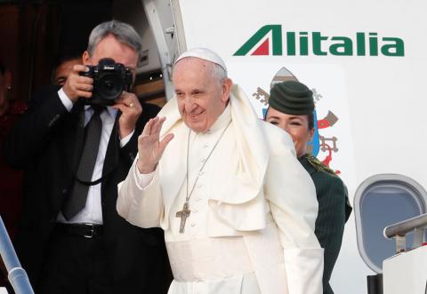 Pope Francis waves as he boards a plane for a two day visit to Ireland at the Leonardo da Vinci-Fiumicino Airport in Rome, Italy, August 25, 2018. PHOTO BY REUTERS/Remo Casilli