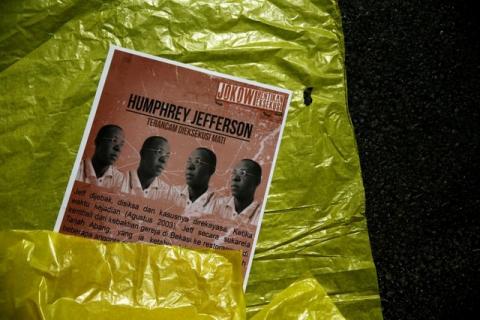 A poster in support of Nigerian death-row prisoner Humphrey Jefferson is seen during a demonstration against Indonesia's decision to execute 14 drug convicts in front of the Presidential Palace in Jakarta, indonesia, July 28, 2016. PHOTO BY REUTERS/Beawiharta