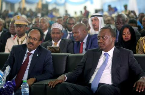 Somalia's newly elected President Mohamed Abdullahi Farmaajo (L) and Kenya's President Uhuru Kenyatta listen to speeches during the inauguration ceremony in Somalia's capital Mogadishu, February 22, 2017. PHOTO BY REUTERS/Feisal Omar