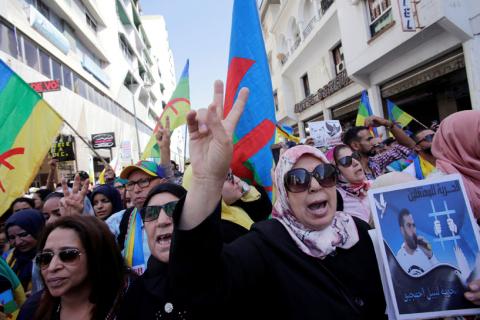 A woman shouts slogans during a demonstration against the Moroccan court, after the jailing of Moroccan activist and the leader of the "Hirak Rif" movement, Nasser Zefzafi and other activists in Rabat, Morocco July 15, 2018. PHOTO BY REUTERS/Youssef Boudlal