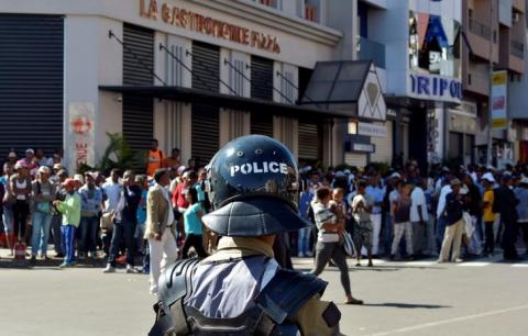 A riot policeman prepares to disperse opposition demonstrators protesting against new electoral laws in Antananarivo, Madagascar, April 21, 2018. PHOTO BY REUTERS/Clarel Faniry Rasoanaivo