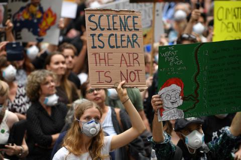 Protesters rally during the "NSW is Burning, Sydney is Choking" Climate Emergency Rally organised by Uni Students for Climate Justice in Sydney, Australia, December 11, 2019. PHOTO BY REUTERS/AAP Image/Dan Himbrechts