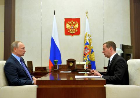 Russian President Vladimir Putin (L) meets with Prime Minister Dmitry Medvedev at the Novo-Ogaryovo state residence outside Moscow, Russia, October 25, 2016. PHOTO BY REUTERS/Sputnik/Alexei Druzhinin