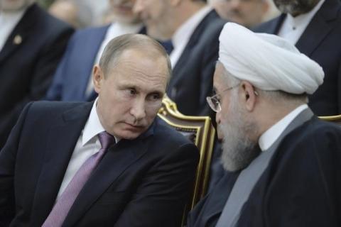 Russian President Vladimir Putin and his Iranian counterpart Hassan Rouhani attend a signing ceremony in Tehran. PHOTO BY REUTERS/Alexei Druzhinin