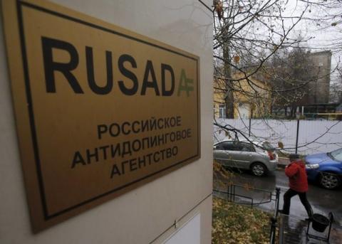 A man walks outside an office of the Russian Anti-Doping Agency (RUSADA) in Moscow, Russia, November 10, 2015. A Moscow laboratory used for doping tests has stopped operating after it was closed by the World Anti-Doping Agency, the head of the Russian Anti-Doping Agency Nikita Kamaev said on Tuesday. PHOTO BY REUTERS/Maxim Shemetov