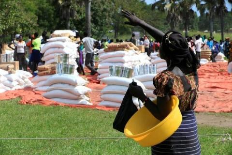 A refugee woman from South Sudan waits to receive food from the World Food Program (WFP) in Palorinya settlement in Moyo district northern Uganda, October 26, 2017. PHOTO BY REUTERS/James Akena