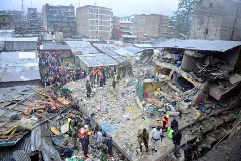 Rescue workers search for residents feared trapped in the rubble of a six-storey building that collapsed after days of heavy rain, in Nairobi, Kenya, April 30, 2016. PHOTO BY REUTERS/John Muchucha