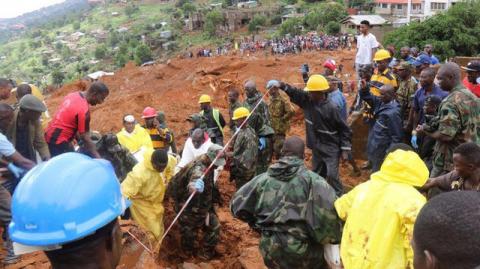 Rescue workers search for survivors after a mudslide in the Mountain town of Regent, Sierra Leone, August 14, 2017. PHOTO BY REUTERS/Sierra Leone Red Cross