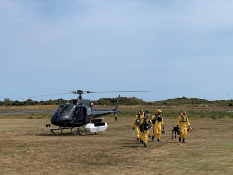 New Zealand Police Search and Rescue and Disaster Victim Identification staff return to Whakatane Airport after conducting a search for bodies in the aftermath of the eruption of White Island volcano, which is also known by its Maori name Whakaari, December 15, 2019. PHOTO BY New Zealand Police